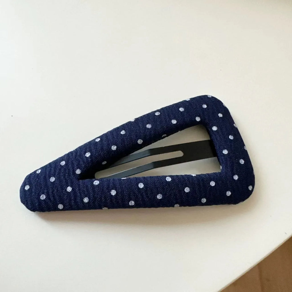 French retro dot pattern barrettes in triangle and water drop shapes with dark denim designs
