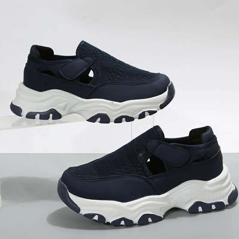 Women's mesh sport shoes with flat heel, round toe, Velcro fastening, and breathable mesh upper in solid colour