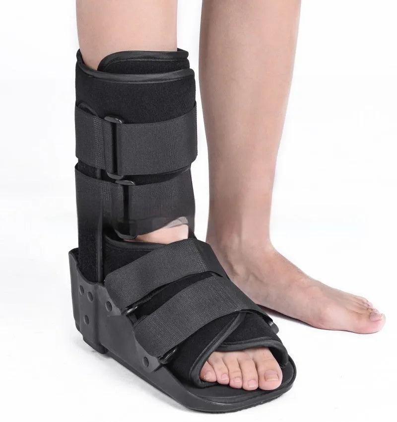 Grey and black Achilles tendon rehabilitation walking aid boot with straps, shown in sizes S, M, L, XL.