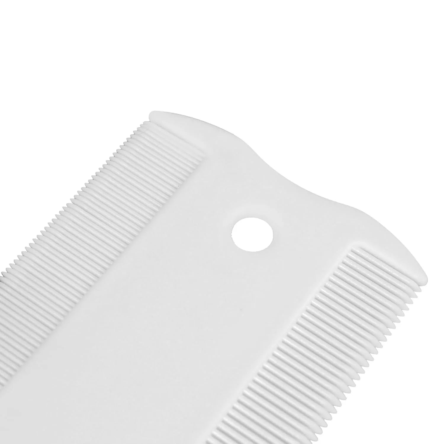 Small white plastic double-sided flea comb for dogs and cats on a plain background.