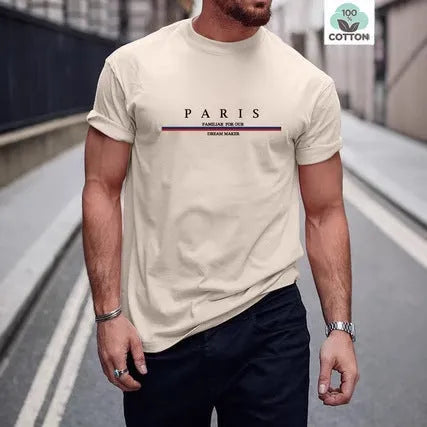 Men's loose fit cotton t-shirt with a printed letter design on the front, shown in apricot colour.