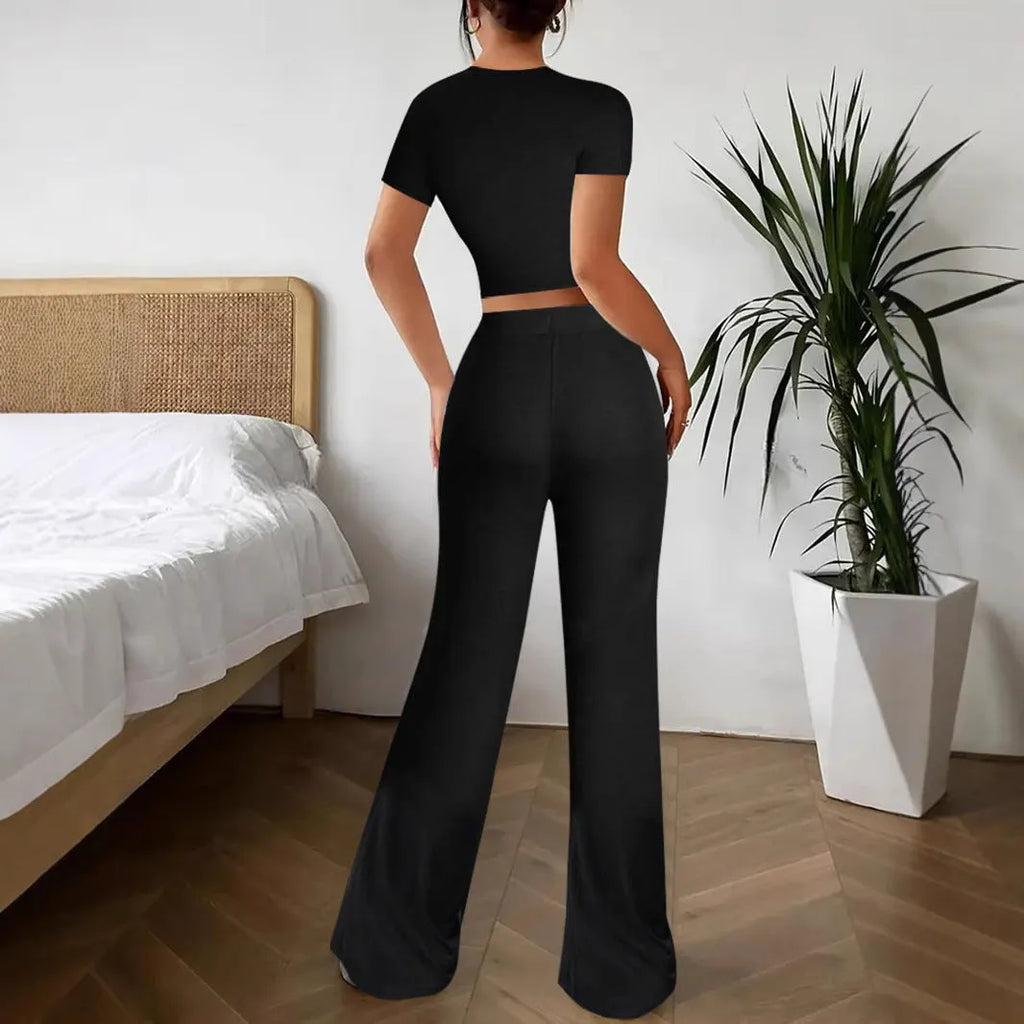 Black high waist trousers and short sleeve T-shirt suit set on hanger