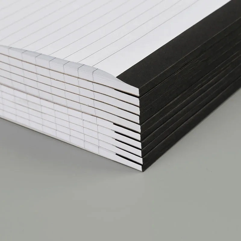 A4 notebook with grid-lined pages and tearable adhesive binding for meeting minutes