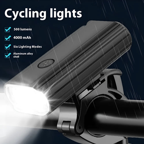 Aluminium alloy bicycle headlight with dual L2 lamps, USB Type-C charging port, and quick-release mounting base.