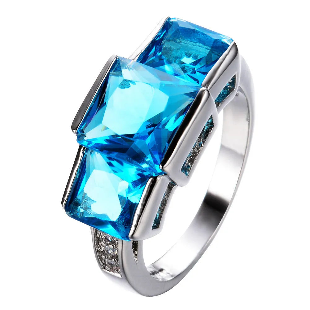 A colourful electroplated copper women's ring with a geometric design, shown in multiple colour options.