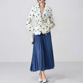 Printed collar suit jacket with lace-up front detail in apricot, shown on a hanger.