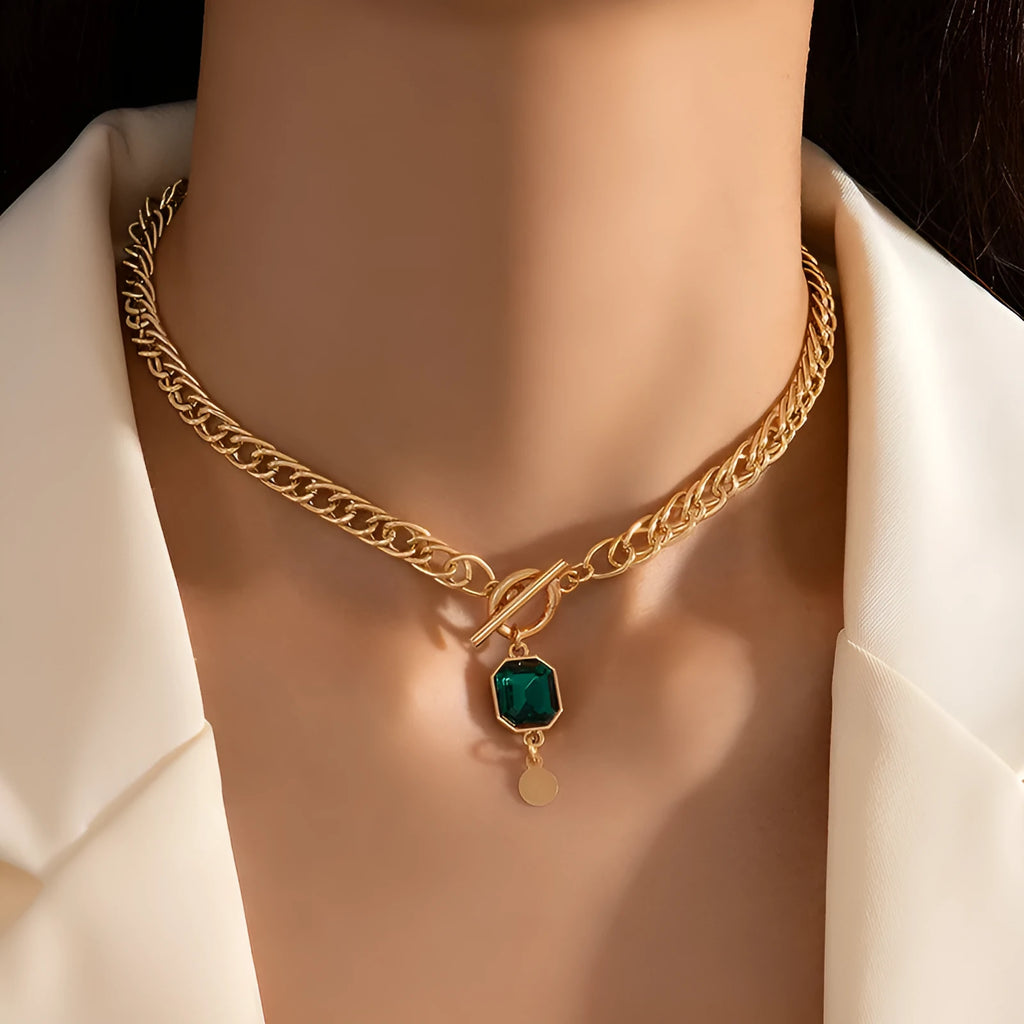 Gold titanium steel necklace with geometric round emerald zircon pendant on Cuban link chain