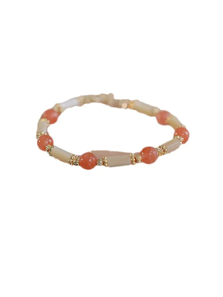 Women's bamboo knot bracelet with 6mm round beads in Hetian jade or South Red agate stone