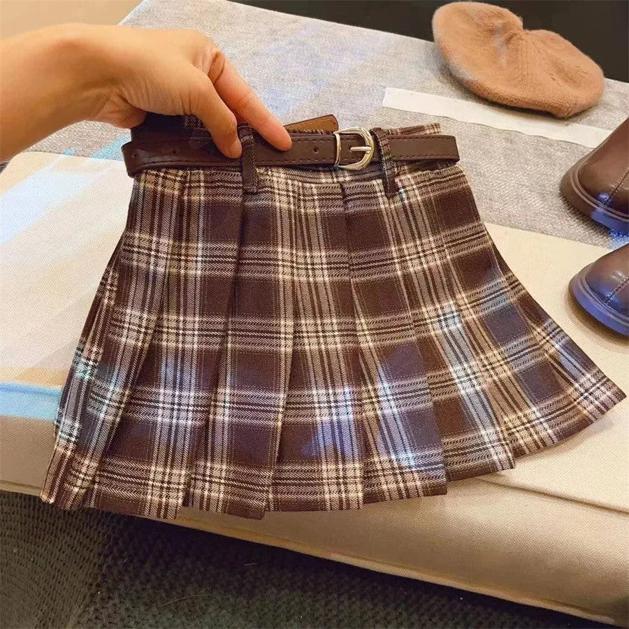 Girls plaid pleated A-line skirt in cotton blend fabric on a hanger