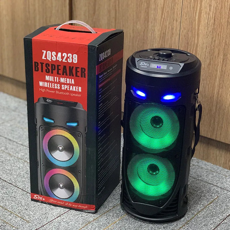 Black portable Bluetooth speaker with dual horn design and wheat aesthetic details