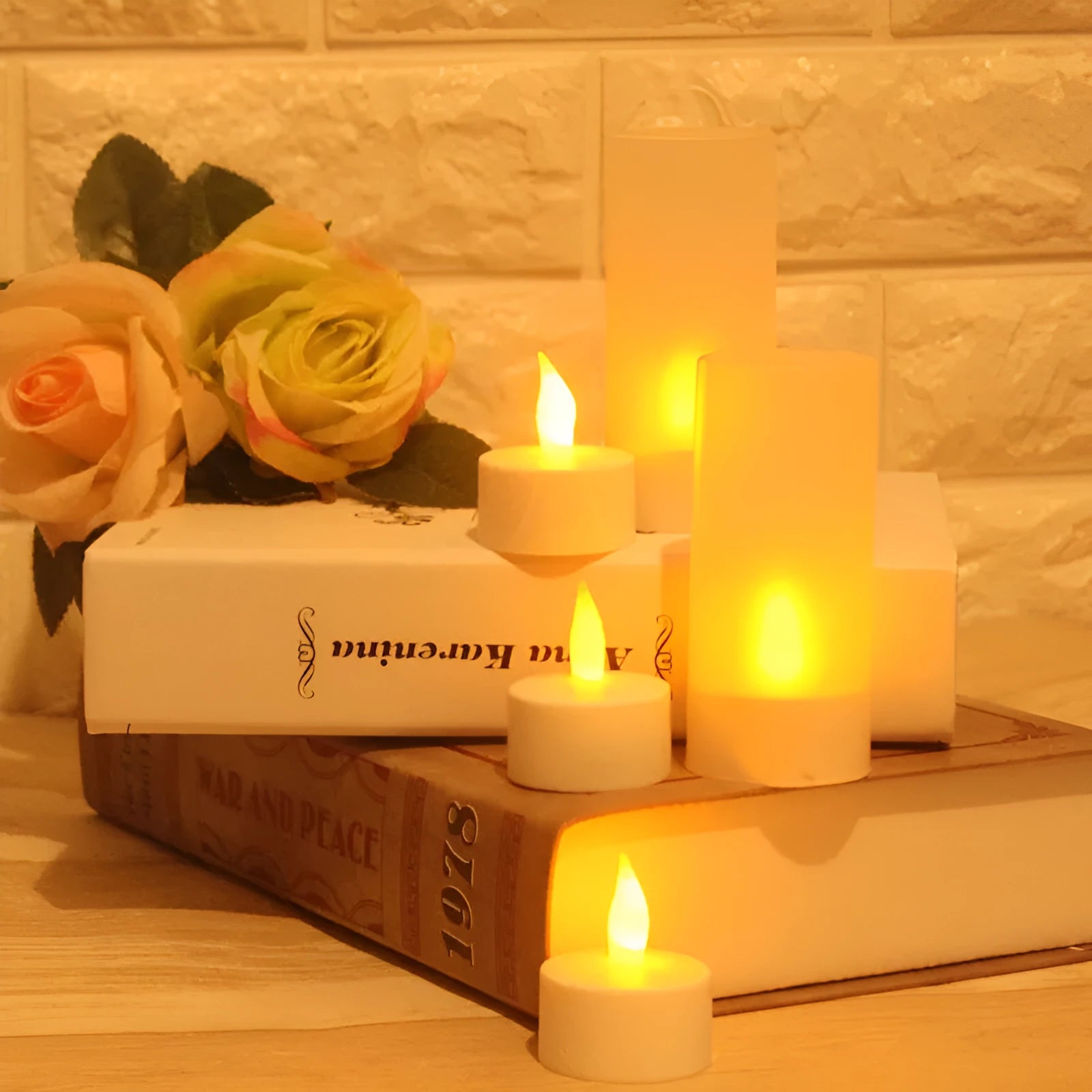 White plastic USB rechargeable LED candle lamp with flickering flame effect on wooden table