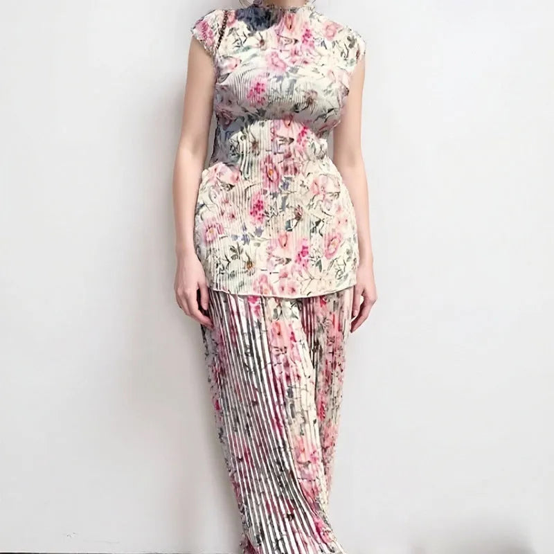 Women's long sleeve printed chiffon top paired with a high waist matching skirt.