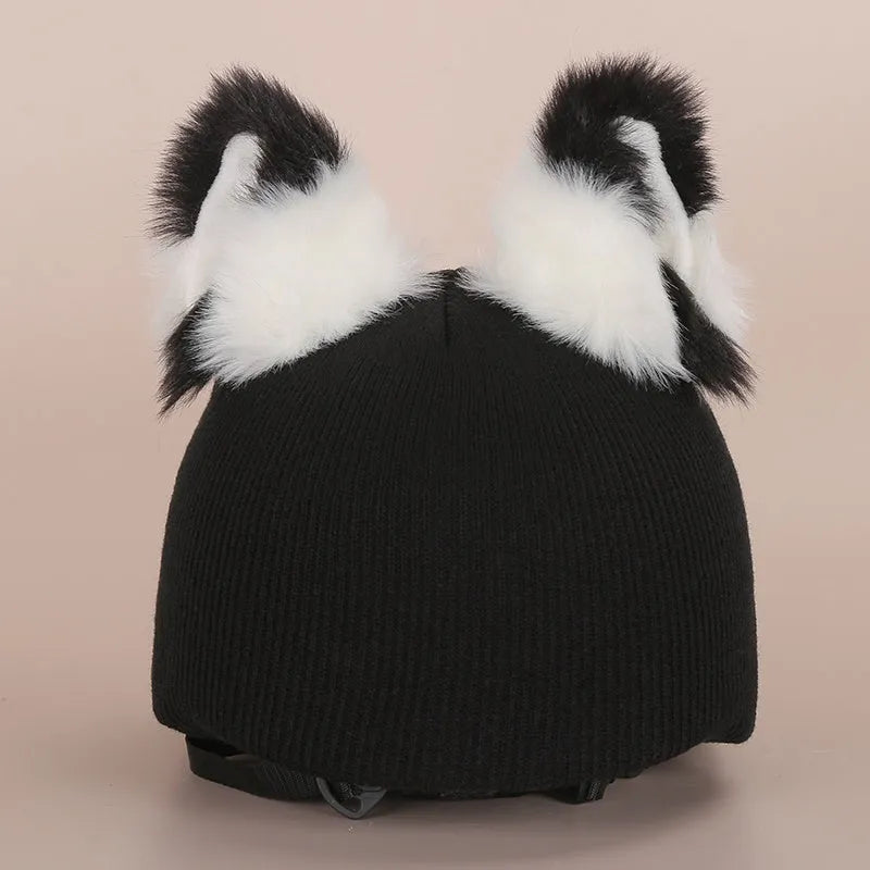 Plush cartoon-themed cover set on a medium motorcycle helmet with soft ear decorations.
