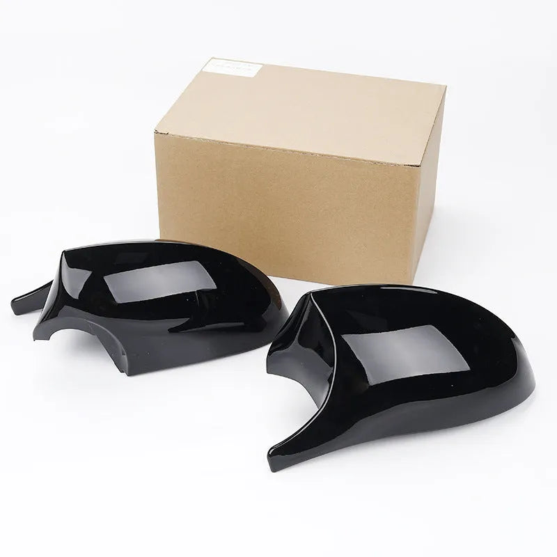 Pair of black ABS plastic rearview mirror housings for BMW 3 Series E90.