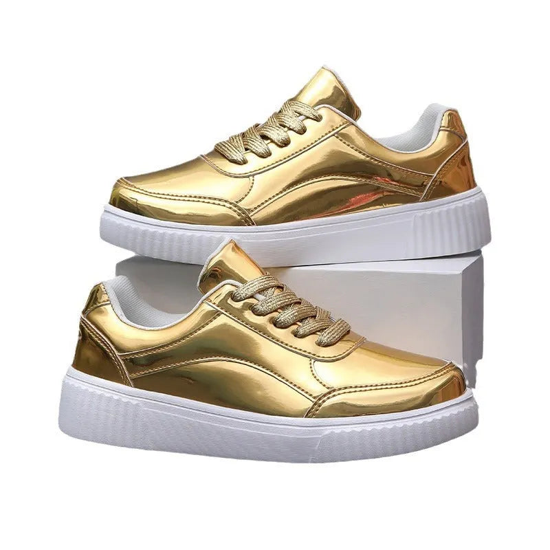 Rose gold sequin platform sneakers with round toe and thick sole.