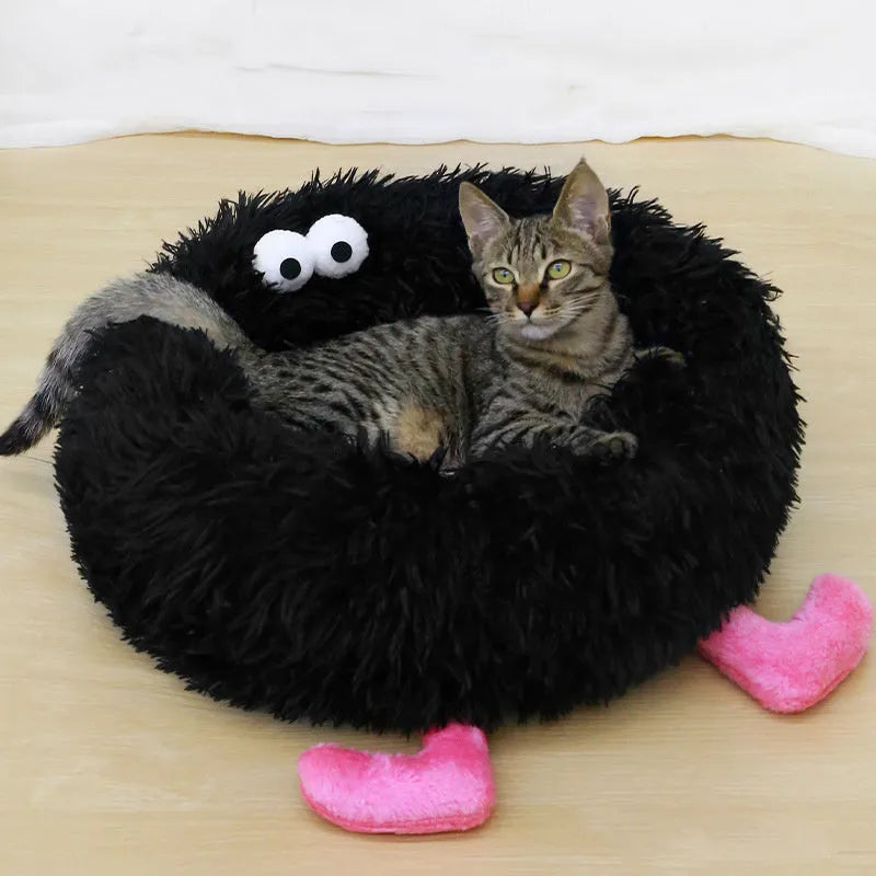 A plush, thick nest-style dog bed for small to medium sized pets, shown in yellow, pink, or black.